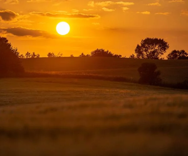 Solnedgang over fjorden ved Søvind